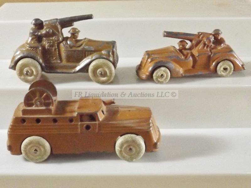 lot 556 image: Antique world war 1 metal military cars