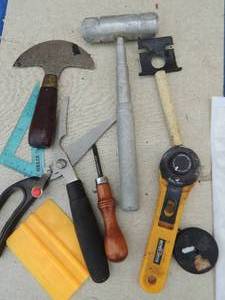 lot 356 image: Leather scissors,  hammer, rotary cutter  blade plus