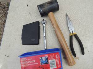 lot 358 image: rubber mallet and needle nose plyers,   14 ratchet, funnel,  drill bits
