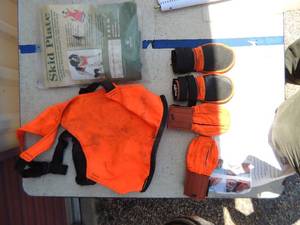 lot 389 image: Skid Plate dog hunting vest  x 2 large,    Dog boots-  Paw protectors black and orange