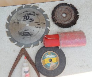 lot 394 image: 10 saw blade, grinding wheel, wire brush 