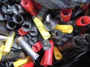 lot 336 image: Empty hulls TRASH Bag full of  12 &  20 gauge