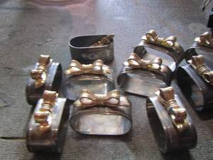 lot 82 image: black ornament piano, 12 bow napkin rings