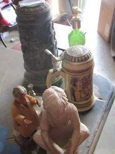 lot 84 image: wooden man statue- Paul Sebastian stein plus
