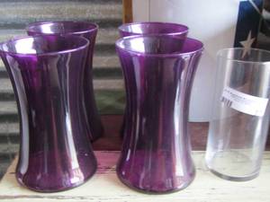 lot 57 image: clear vase and purple vases qty 4  total with clear is 5