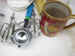 lot 127 image: silverware , can opener, Waring mixer, Ice cream scoop and more