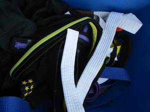 lot 133 image: box of karate belt and karate jacket