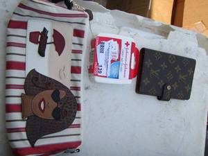 lot 139 image: Louis VUITON  booklet, purse plus - NOT AUTHENICATED
