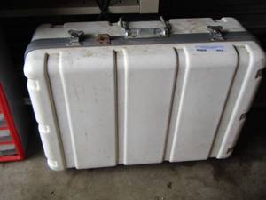 lot 202 image: White hard-shell case