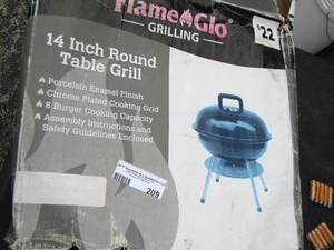 lot 209 image: 14 round table grill