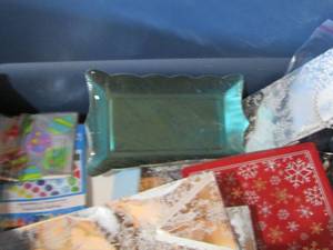 lot 86 image: blue tote of gift bags, paper plates, goodie bags and decorations