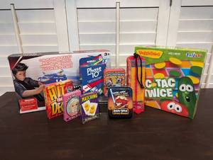 lot 84 image: 9 GameToy Set AngryBirds Star Wars Playing Cards, CATAPULT Clider Gun, VeggieTales Tic-Tac-Twice, Phase 10, Hit the Deck, PassPlay The Game of LeftCenterRight, Old Maid, Matching, and Timber Tumble