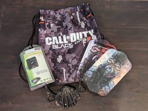 lot 107 image: NEW - XBOX Game Switch Automatic TVGame RF Switch with Call of Duty Black Ops II Play Set