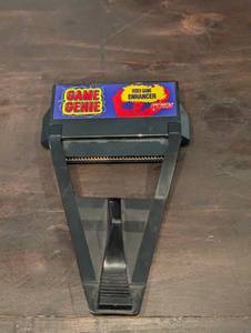 lot 163 image: SEGA Genesis Game Genie