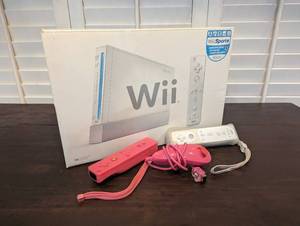 lot 165 image: Wii Sports Console with 3 Remotes and 2 Nunchucks