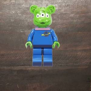 lot 33 image: Bearbrick DisneyPixar Toy Story  Alien Minifigure Dark Green (Set 1) - NEW