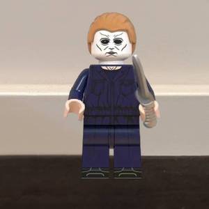 lot 14 image: MICHAEL MYERS Halloween Custom Printed & Inspired Lego Horror Minifigure