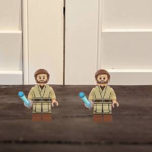 lot 20 image: Lego Obi-Wan Kenobi 9494 Dark Tan Legs Star Wars Minifigure With Lightsaber - NEW