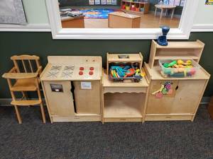 lot 59 image: Large Lot of Kaplan Wooden Kitchen Play Center Items.  Includes Highchair, Stove, Hutch (small), Hutch (large) & Lots of accoessories