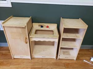 lot 91 image: Lot of 3 Kaplan  Wooden Play Kitchen Furniture Items.  Includes Shelf, Sink & Refrigerator