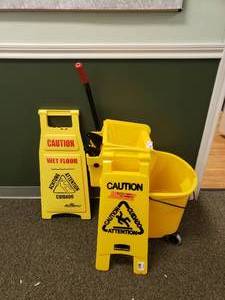 lot 127 image: Rubbermaid Wave Brake Mop Bucket w Caution Signs