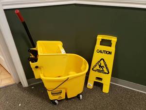 lot 128 image: Rubbermaid Wave Brake Mop Bucket w Caution Sign