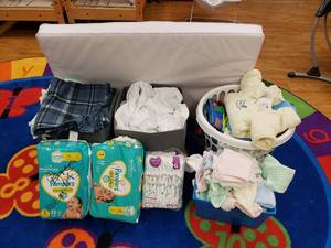 lot 144 image: Lot of Misc Baby Bedding Accessories.  Includes Crib Mattress, Diapers, Blankets, Bed Sheets, & Much More