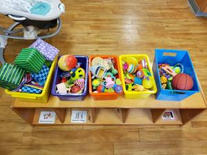 lot 182 image: Lot of 5 Bins w Misc Bay Items. Soft toys, Teethers & Noice Makers