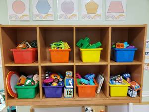 lot 187 image: Contents of Shelf.  Misc Baby Toys, Soft Books & More.  Shelf Not Included.