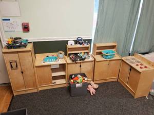 lot 254 image: Large Lot of Kaplan Wooden Play Kitchen Furniture w Accessories.  Includes Refrigerator, Sink, Hutch (qty 2), Stove & Play Food