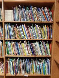lot 314 image: Large Lot of Classroom Books.  Contents of 4 Shelves Pictured.