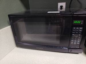lot 445 image: Insignia 0.7 Cu Ft Compact Microwave, Model NS-MW07BK0