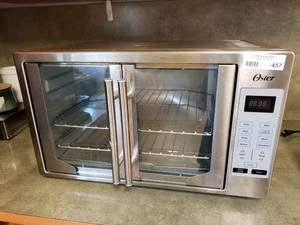 lot 457 image: Oster Convection Over 9-in-1 Countertop Toaster, Model TSSTTVFDDG