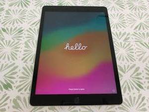 lot 16 image: Apple iPad 9th Generation w 65GB Storage, Model A2602.  Has been factory reset.