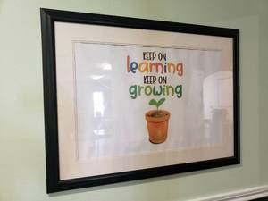 lot 529 image: Large framed and matted keep on learning print