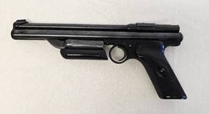 lot 8 image: Vintage Crossman 130 .22 caliber pellet pistol as shown.