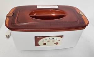 lot 9 image: GIGI DIGITAL PARAFFIN BATH MODEL 0953C AS SHOWN.