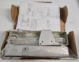 lot 14 image: DORMA SURFACE MOUNT DOOR CLOSER 8616 IN BOX AS SHOWN.