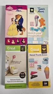 lot 21 image: LOT OF 4 CRICUT CARTRIDGES AS SHOWN.