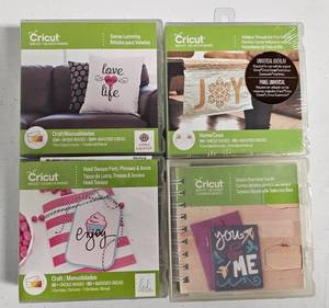 lot 22 image: LOT OF 4 CRICUT CARTRIDGES INCLUDING ONE UNOPENED AS SHOWN.