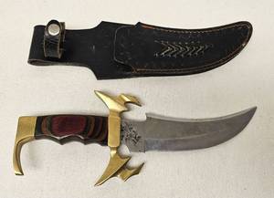 lot 5 image: Custom 12 inch brass and rosewood handle knife with leather sheath as shown.