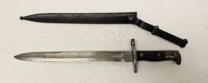 lot 83 image: Antique Krag-Jrgeson 16 inch Rifle Bayonet Model of 1901 with original sheath as shown.