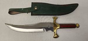 lot 53 image: Vintage 18 inch Chipaway Cutlery brass and wood handle knife with leather sheath as shown.