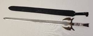 lot 75 image: Medieval theme 39 inch decorative sword with sheath as shown.