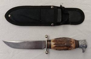 lot 85 image: Vintage Solingen Germany 9.5 inch stag eagle head handle hunting knife with leather sheath as shown.