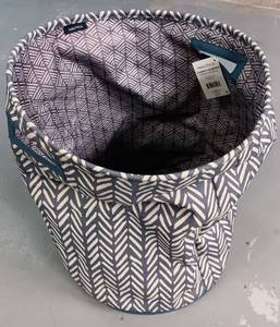 lot 125 image: NAUTICA HAMPER IN STYLE SHOWN.