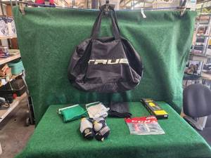 lot 215 image: Selection of hockey supplies in bag