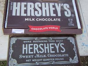 lot 23 image: Hersheys wall sign and Hersheys largest chocolate bar ( not edible)