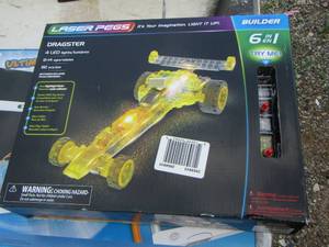 lot 26 image: Laser pegs dragster Lego car- crayon light board