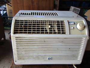 lot 34 image: Used GE air conditioner window unit